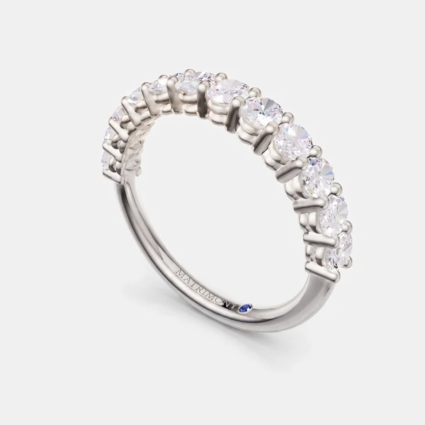 Churumbela oval, oro blanco, piedras de 0.10 ct